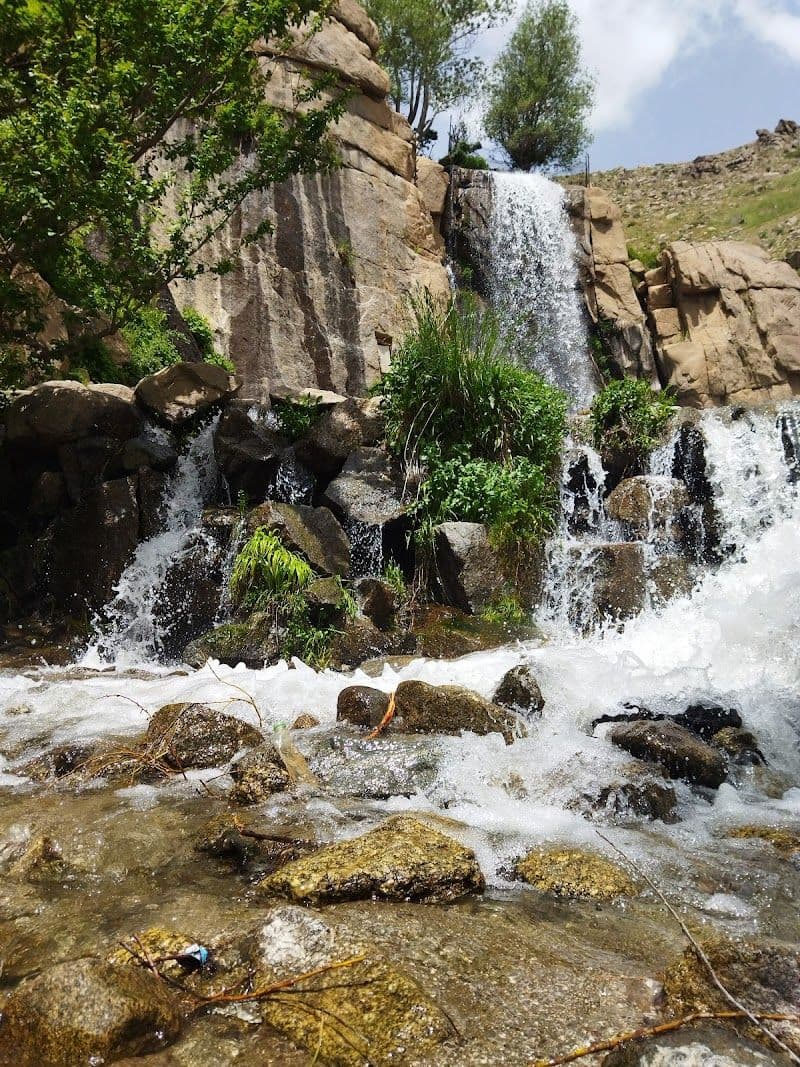 Explore the Ganjnameh Inscriptions and Waterfall