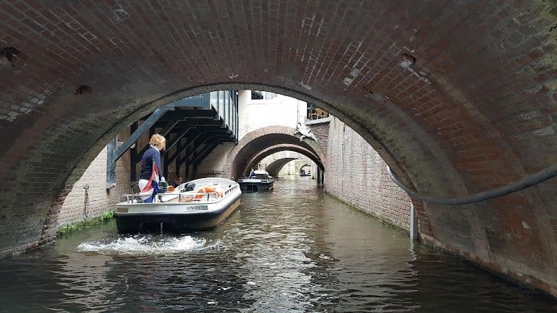 Take a boat tour through the Binnendieze canals