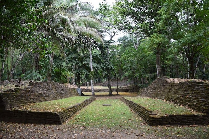 Visit the Nim Li Punit Mayan Ruins nearby