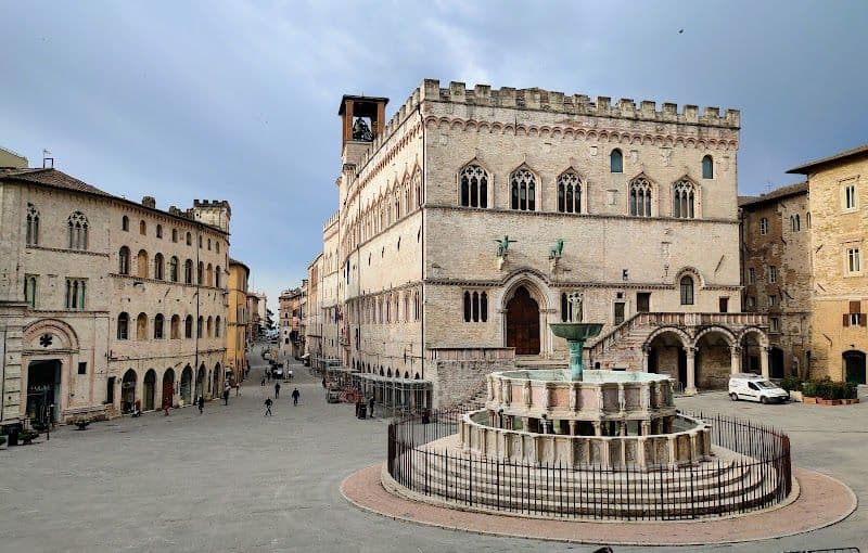 Visit the historic center and Piazza IV Novembre